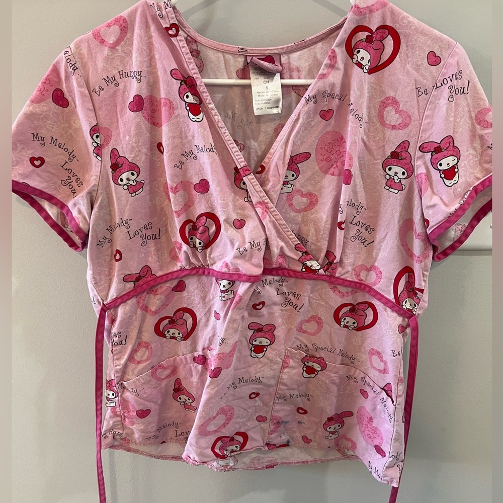 Size small scrub top